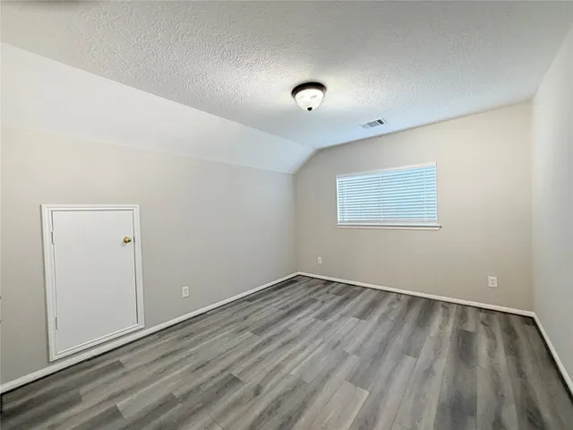 a view of a hallway with staircase