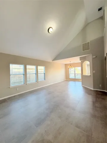 an empty room with windows