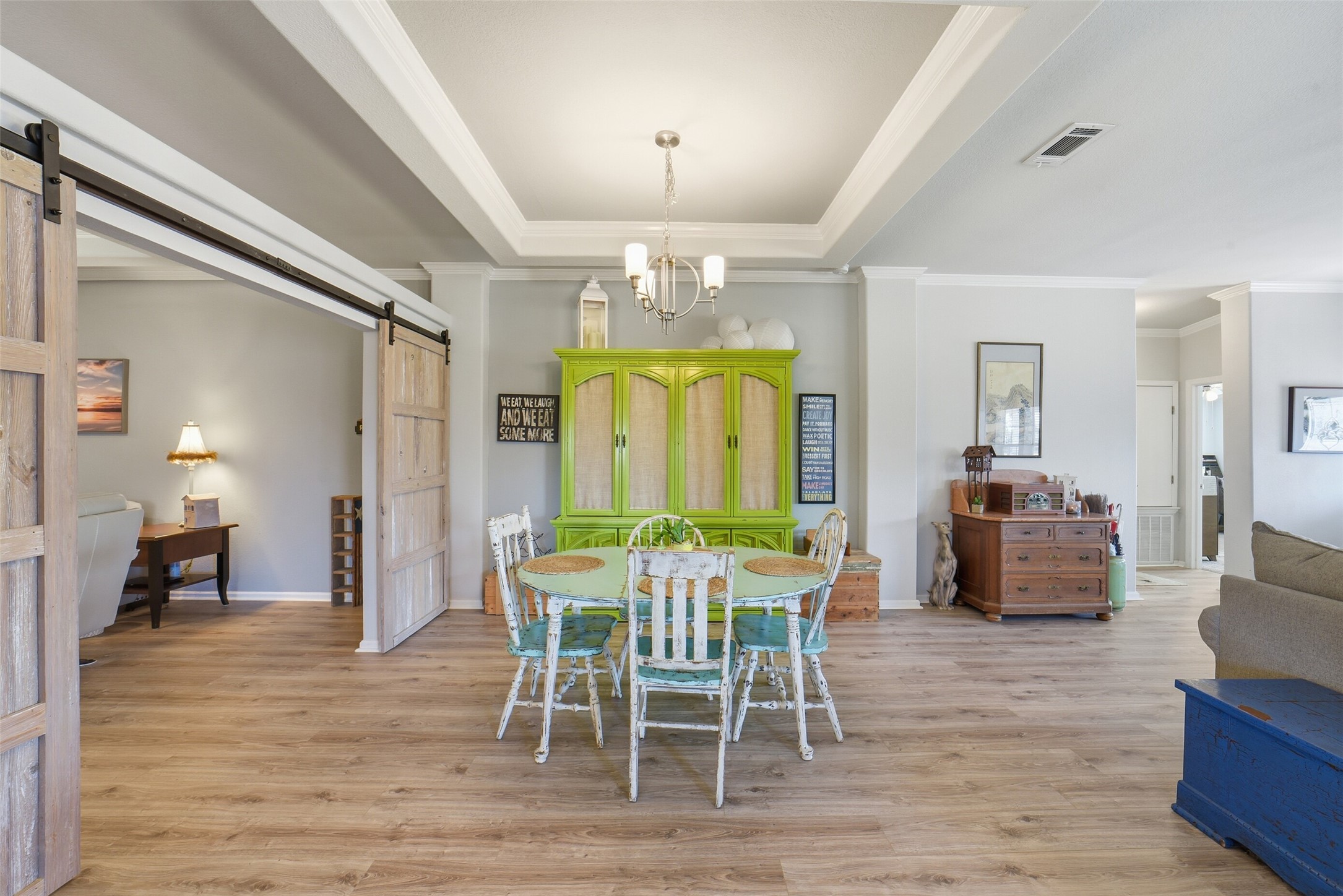 4007 Nancy Lane, Unit C546B Rosharon, TX 77583 - Photo 23 of 50 a view of a dining room with furniture and chandelier