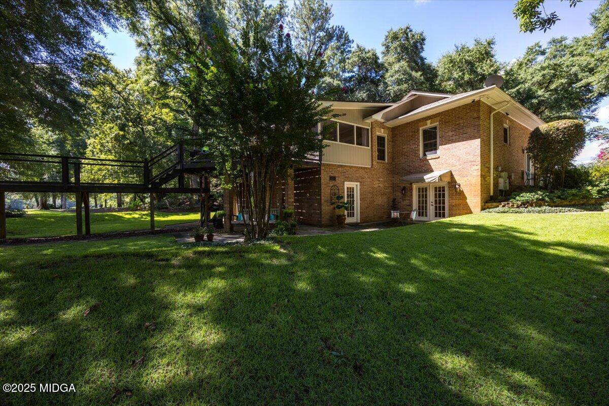 11 River Trace Macon, GA 31210 - Photo 12 of 61 a front view of house with yard and green space