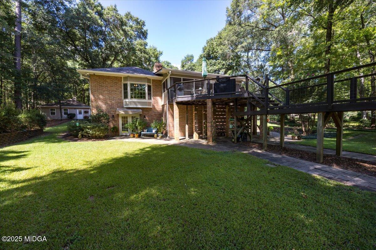 11 River Trace Macon, GA 31210 - Photo 16 of 61 a view of a house with a yard and sitting area