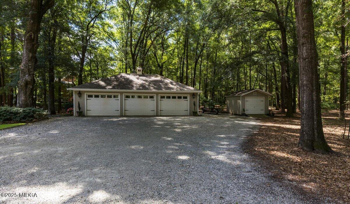 11 River Trace Macon, GA 31210 - Photo 22 of 61 a view of a house with a yard and tree s