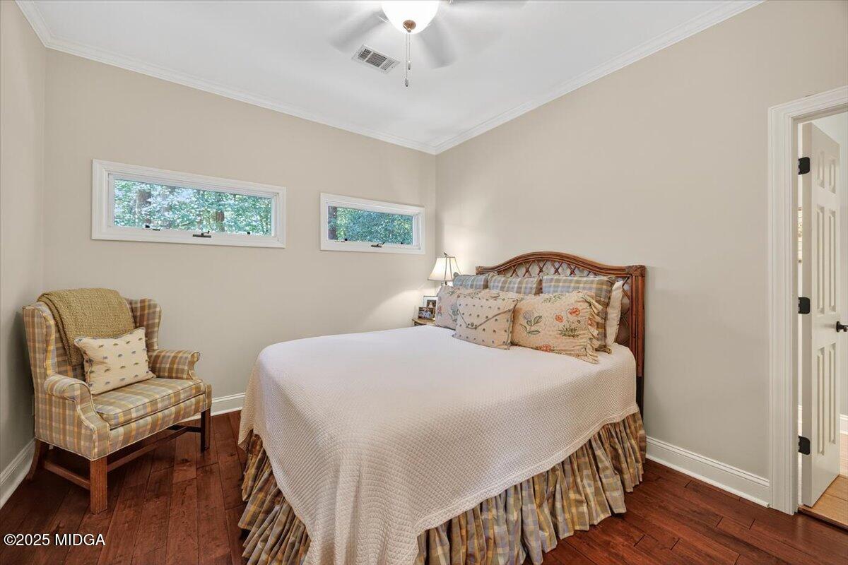 11 River Trace Macon, GA 31210 - Photo 44 of 61 a bedroom with a bed and a chair