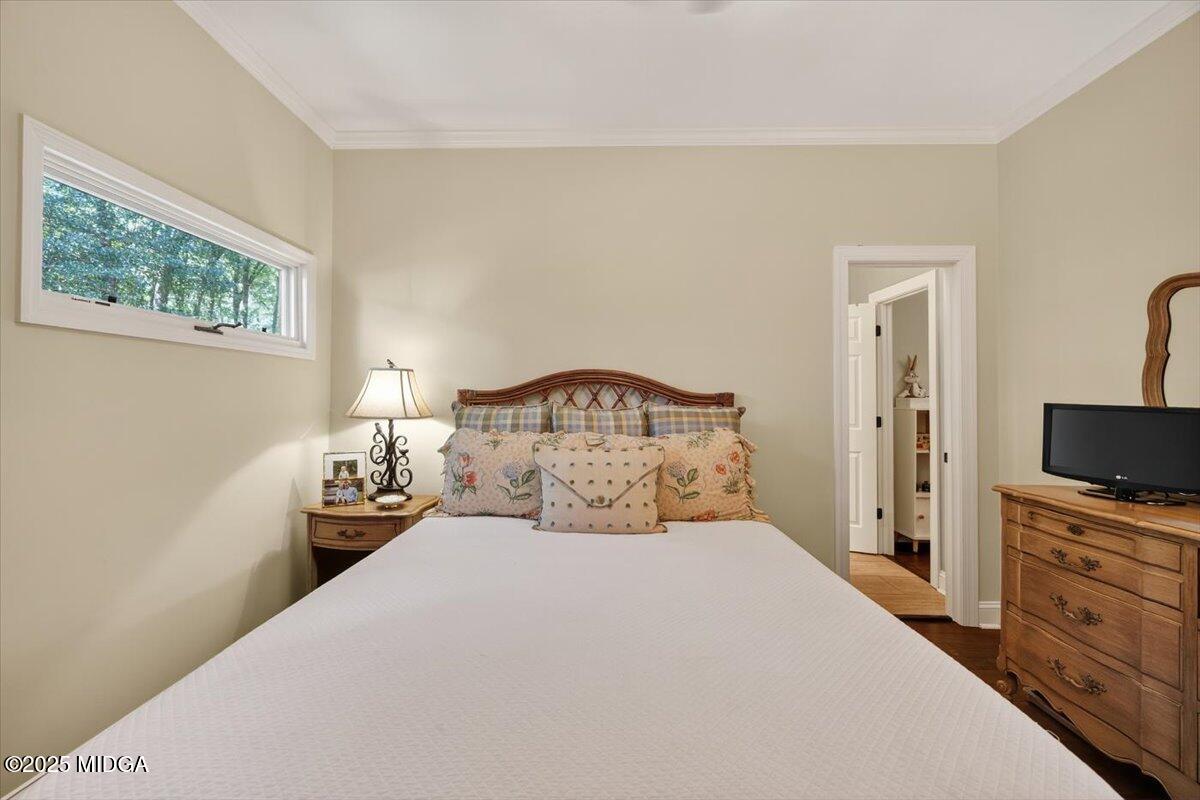 11 River Trace Macon, GA 31210 - Photo 45 of 61 a bedroom with a bed and a tv on the dresser