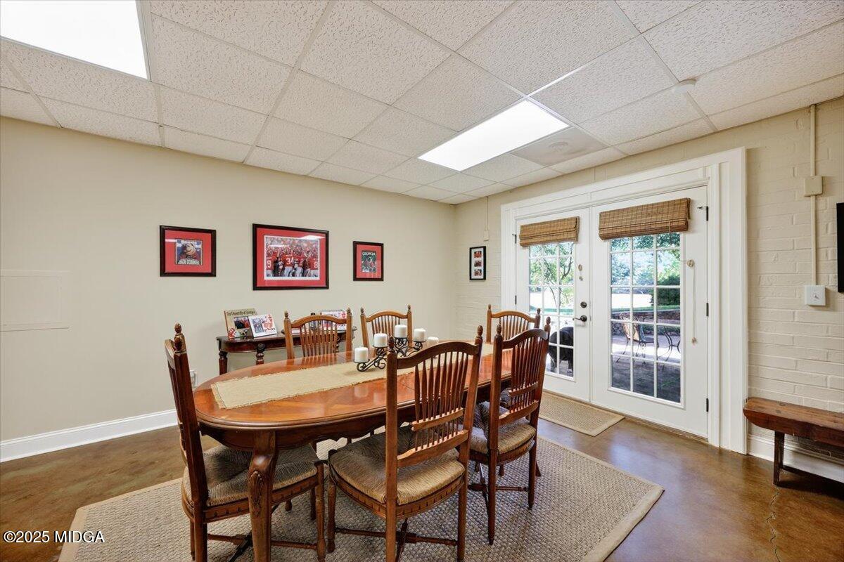 11 River Trace Macon, GA 31210 - Photo 55 of 61 a view of a dining room with furniture window and wooden floor