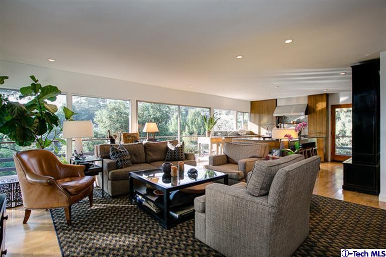 385 Manford Way Pasadena, CA 91105 - Photo 12 of 44 a living room with furniture floor to ceiling window and a table