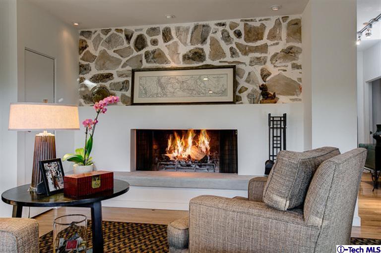 385 Manford Way Pasadena, CA 91105 - Photo 14 of 44 a living room with furniture and a fireplace