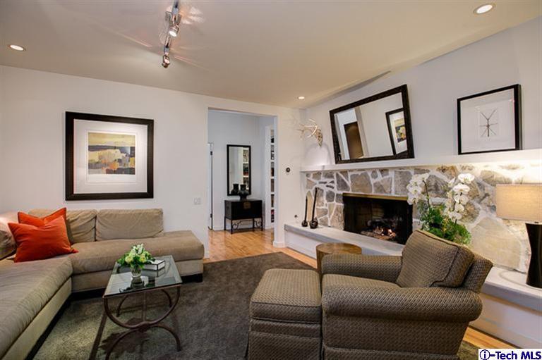 385 Manford Way Pasadena, CA 91105 - Photo 5 of 44 a living room with furniture and a fireplace