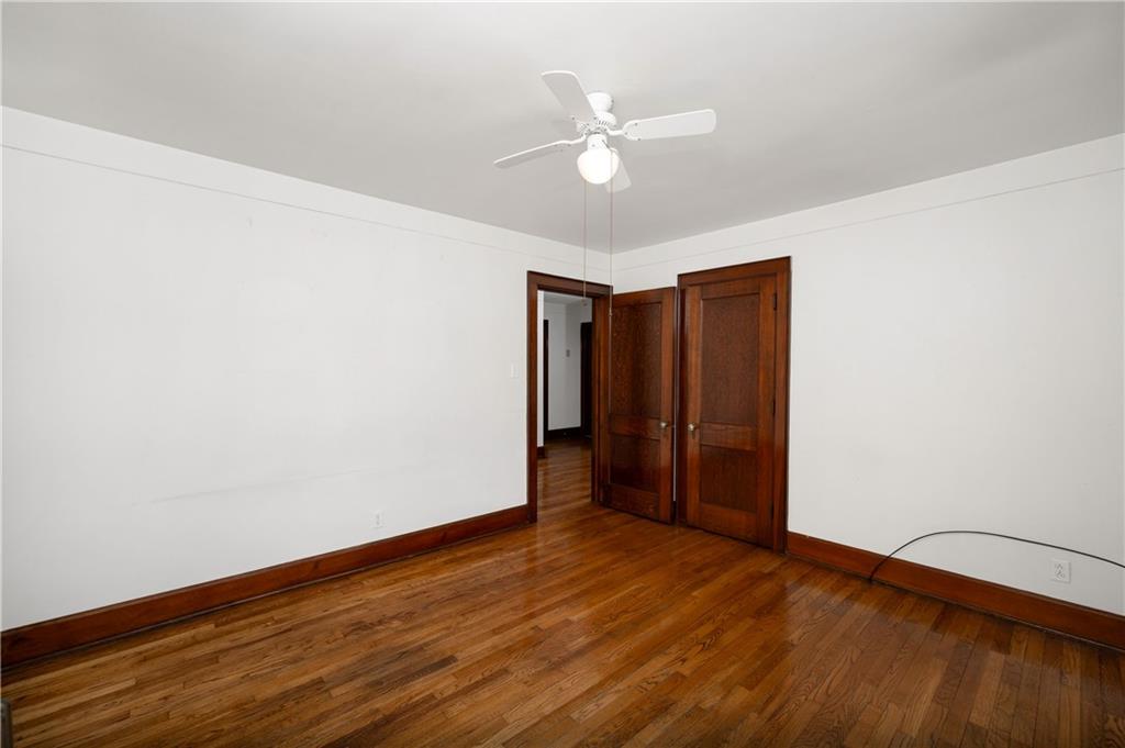 125 Merritt Drive Butler, PA 16001 - Photo 15 of 38 a view of an empty room with wooden floor