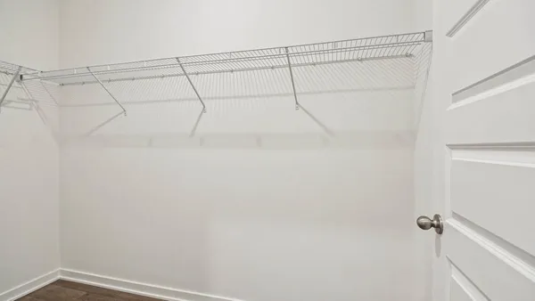 a view of a room with racks on the wall