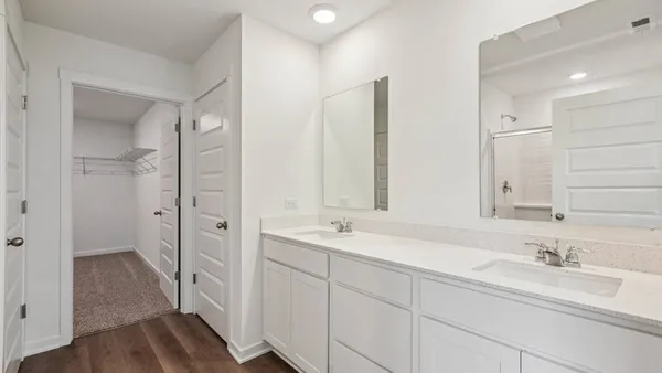 a bathroom with a shower and a toilet