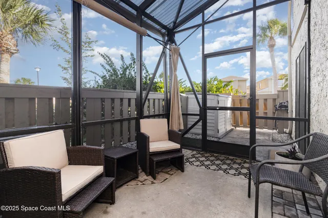 a view of a porch with furniture