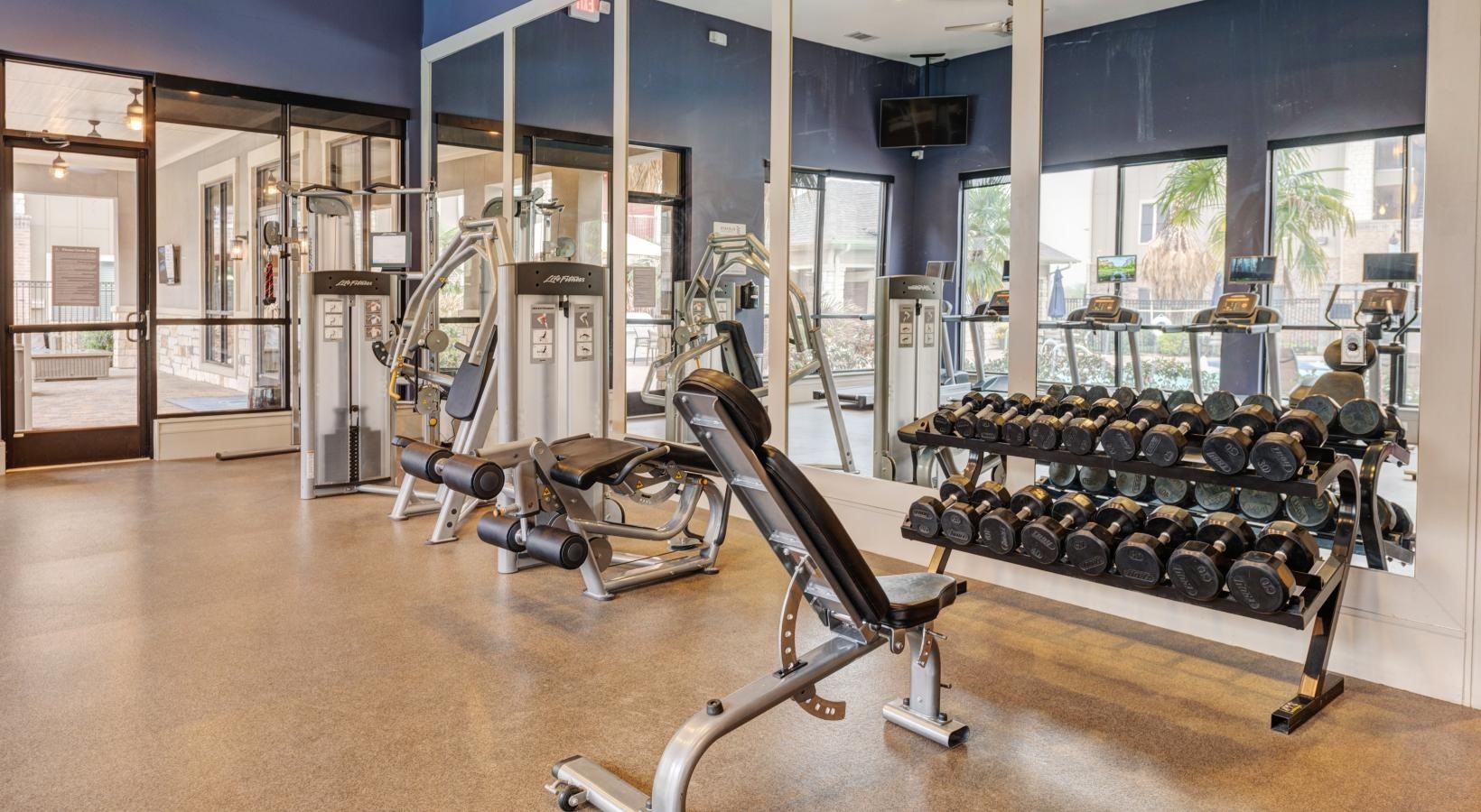 a view of a room with gym equipment