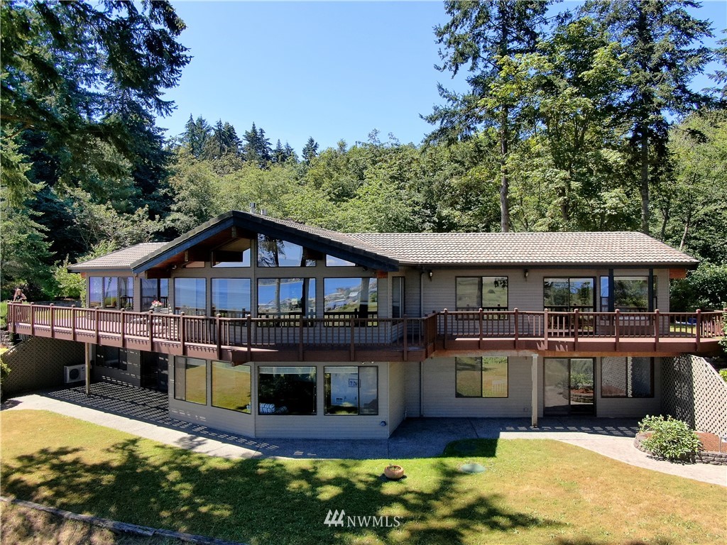 6188 Double Bluff Road Freeland, WA 98249 - Photo 2 of 40 a swimming pool view with a seating space