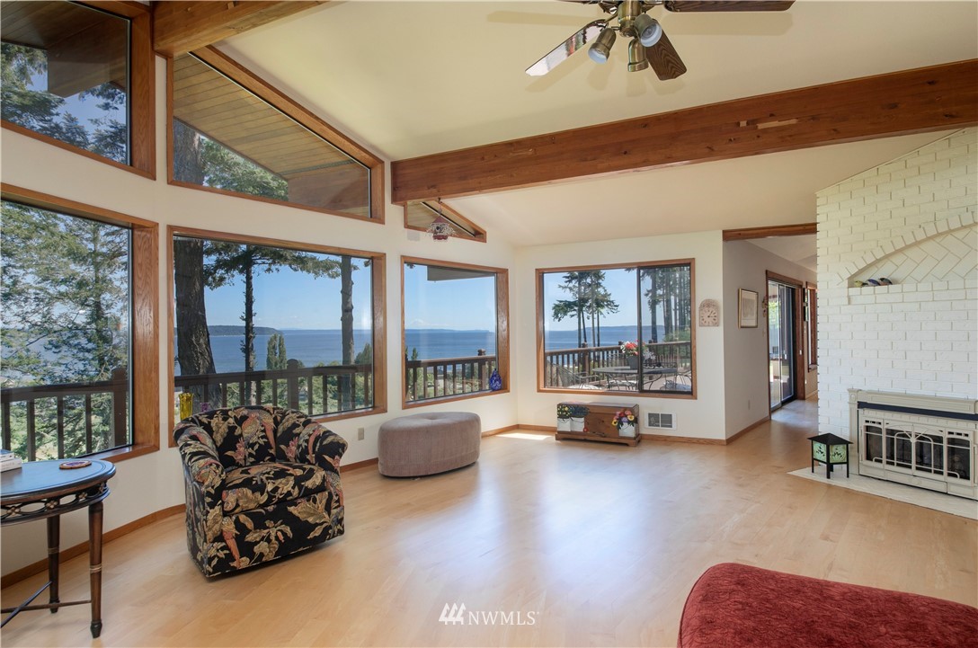 6188 Double Bluff Road Freeland, WA 98249 - Photo 20 of 40 a living room with furniture and a large window