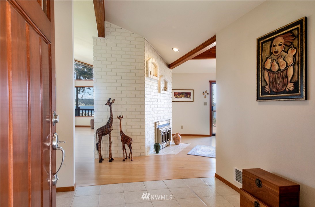 6188 Double Bluff Road Freeland, WA 98249 - Photo 26 of 40 a view of a hallway with furniture