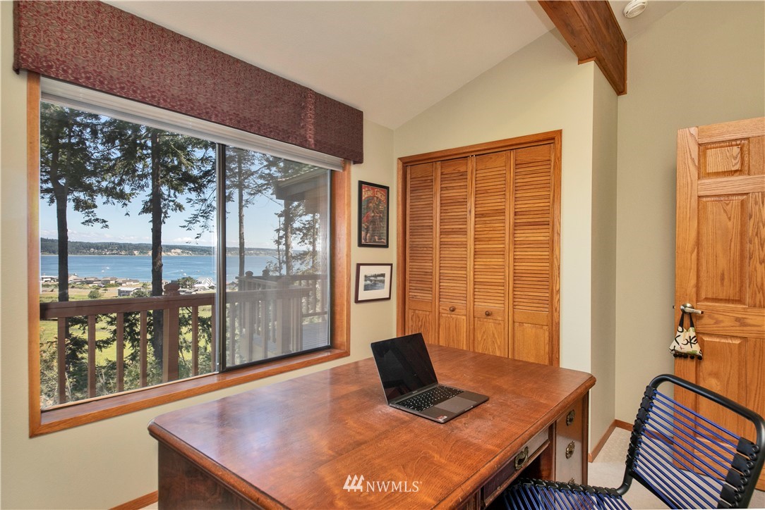 6188 Double Bluff Road Freeland, WA 98249 - Photo 32 of 40 a view of a workspace with furniture and window