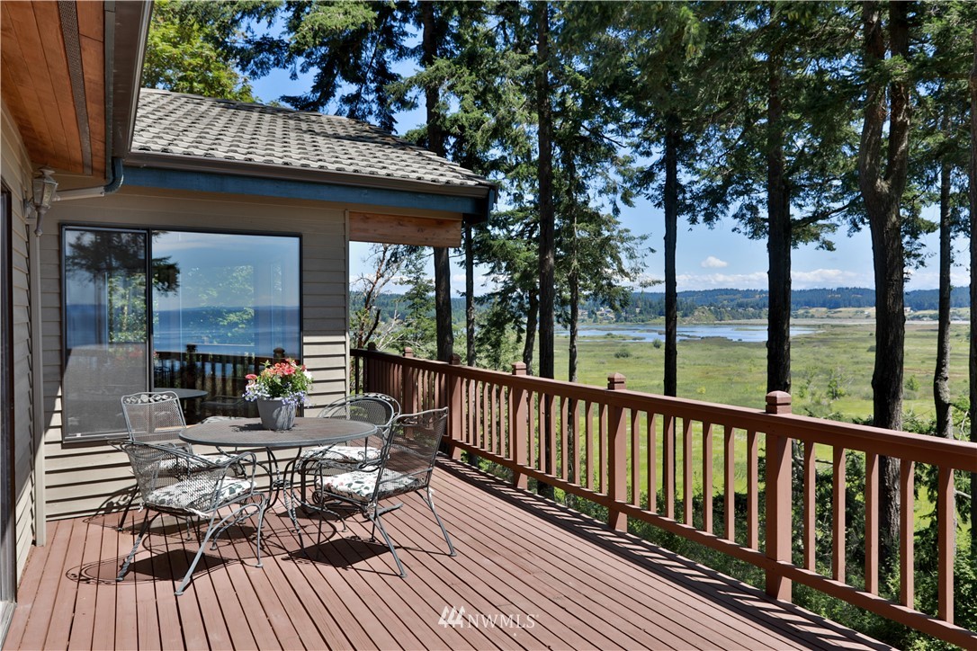 6188 Double Bluff Road Freeland, WA 98249 - Photo 8 of 40 a view of a chairs and tables on the roof deck