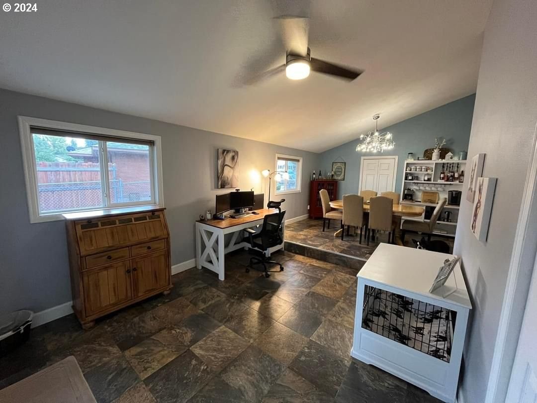 1516 Southwest 41st Street Pendleton, OR 97801 - Photo 12 of 20 a living room with furniture and a dining table