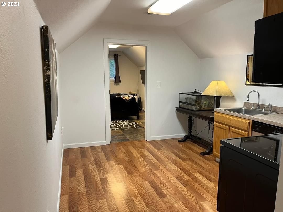 1516 Southwest 41st Street Pendleton, OR 97801 - Photo 20 of 20 a bedroom with a bed and a flat screen tv