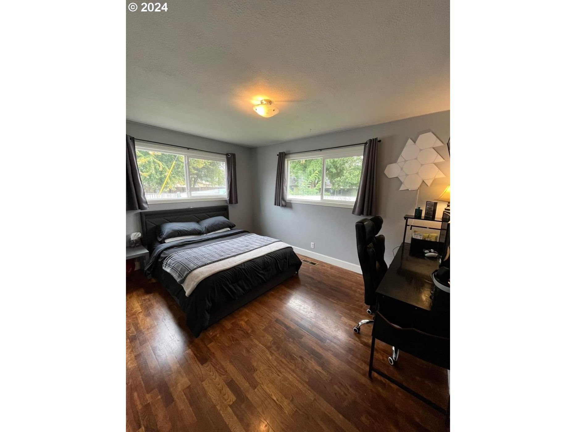 1516 Southwest 41st Street Pendleton, OR 97801 - Photo 8 of 20 a bedroom with a bed and a window