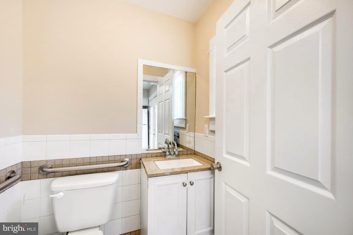 411 North Rock Glen Road Baltimore, MD 21229 - Photo 25 of 38 Half Bath