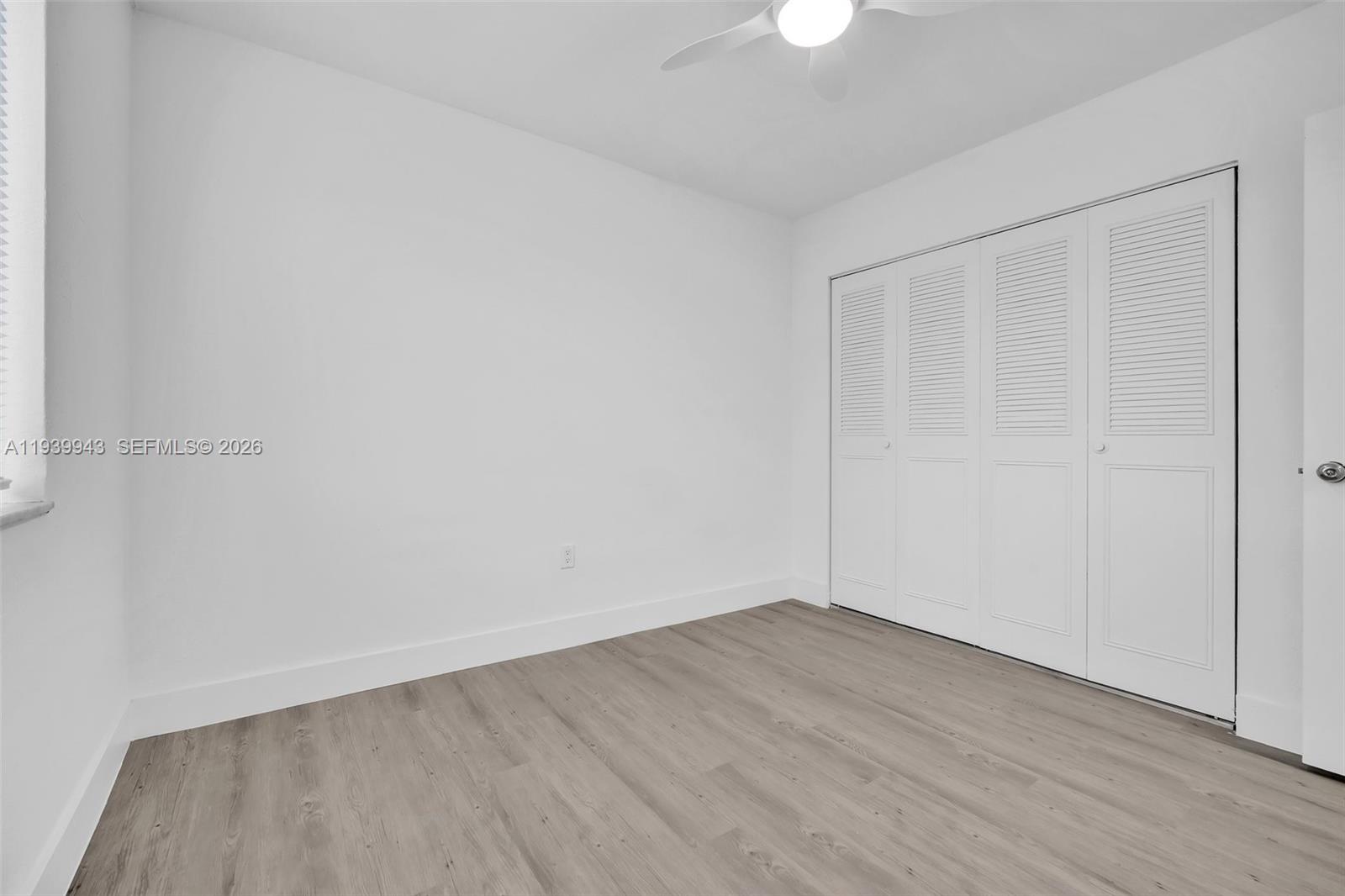 1530 Southwest 2nd Street, Unit 301 Miami, FL 33135 - Photo 3 of 12 wooden floor in an empty room