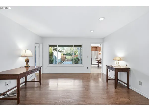 a view of a livingroom with furniture and wooden floor