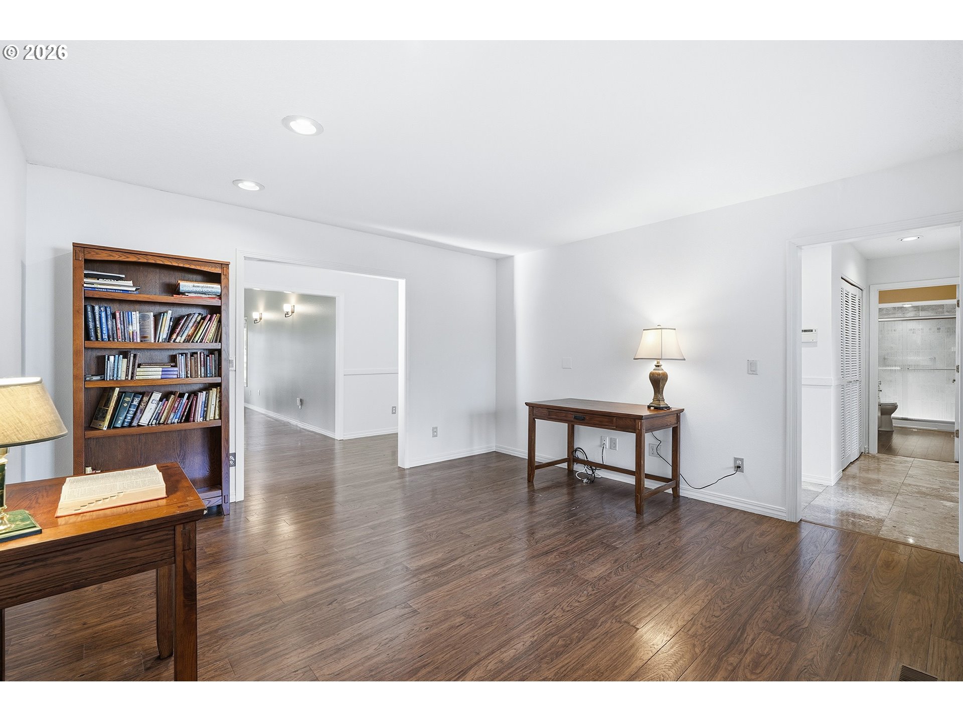 32565 Southwest Lake Point Court Wilsonville, OR 97070 - Photo 24 of 48 a view of a livingroom with furniture and wooden floor