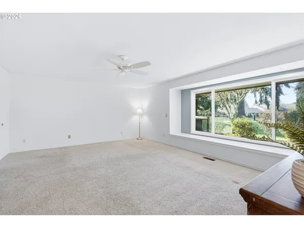a room with furniture and window