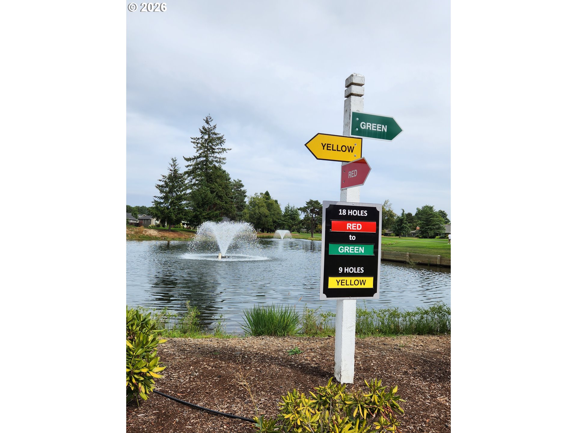 32565 Southwest Lake Point Court Wilsonville, OR 97070 - Photo 48 of 48 a bathroom with a sink and a mirror