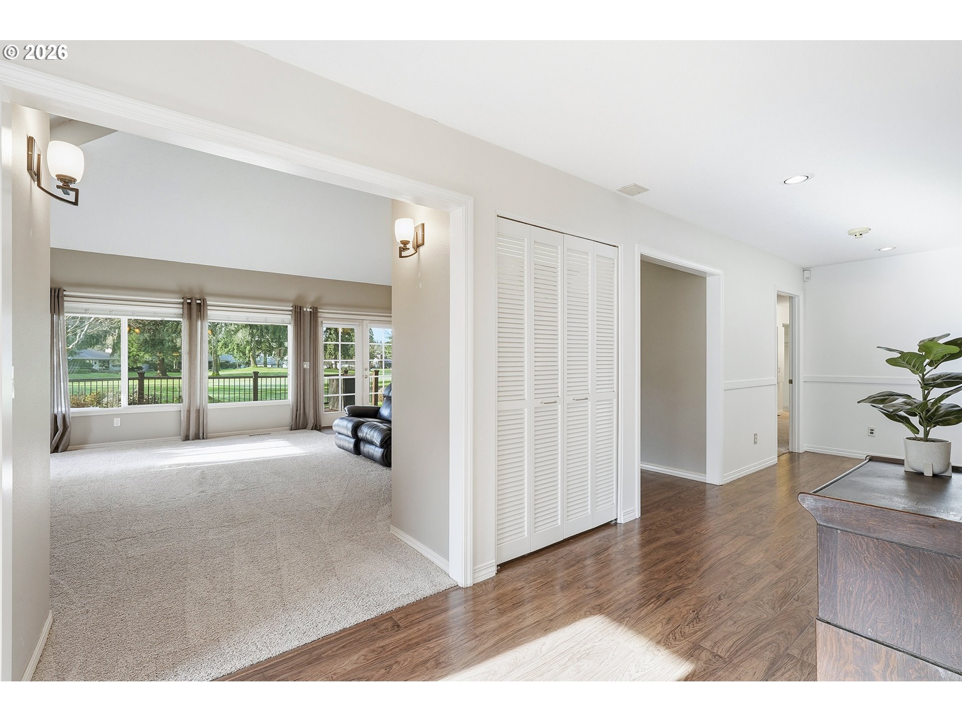 32565 Southwest Lake Point Court Wilsonville, OR 97070 - Photo 6 of 48 a view of a livingroom with wooden floor and furniture