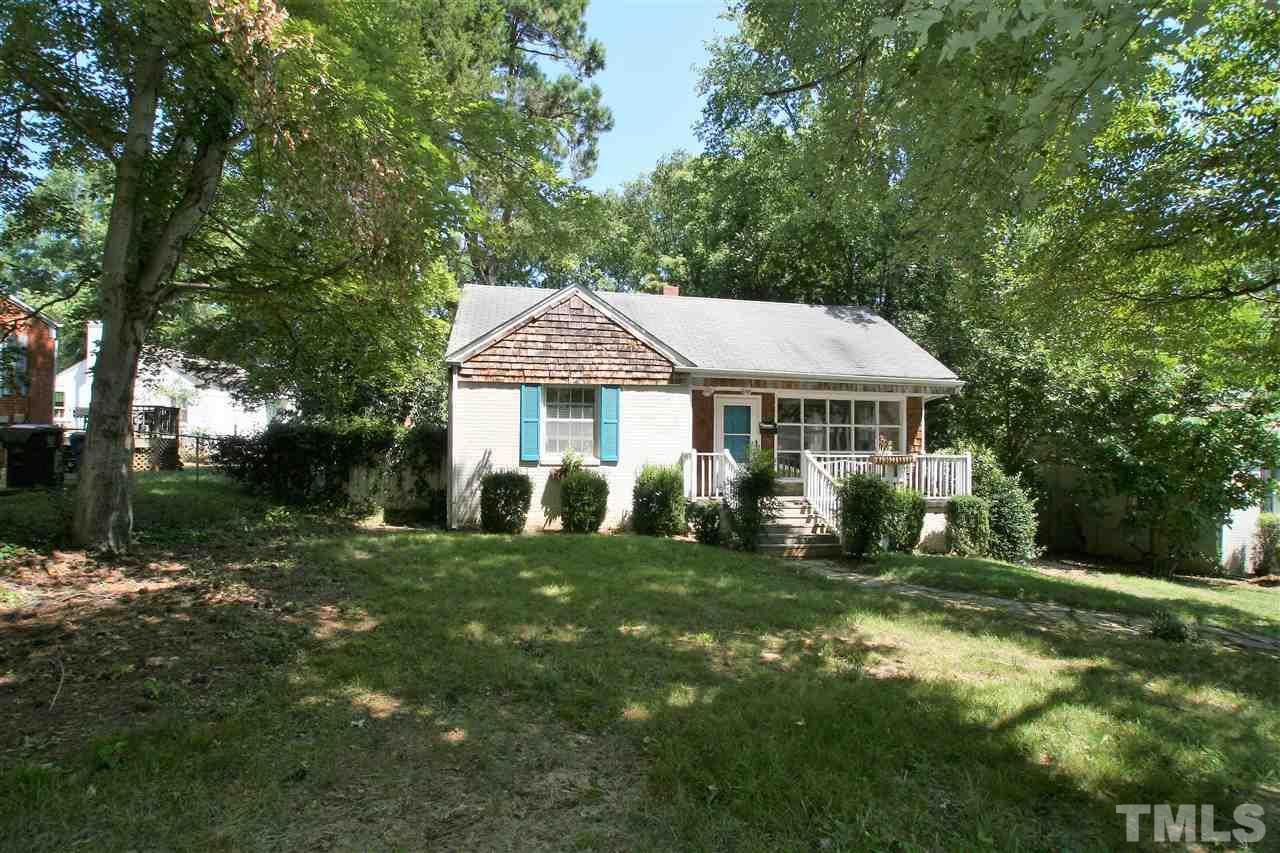 705 Mial Street Raleigh, NC 27608 - Photo 1 of 14 a front view of a house with a yard