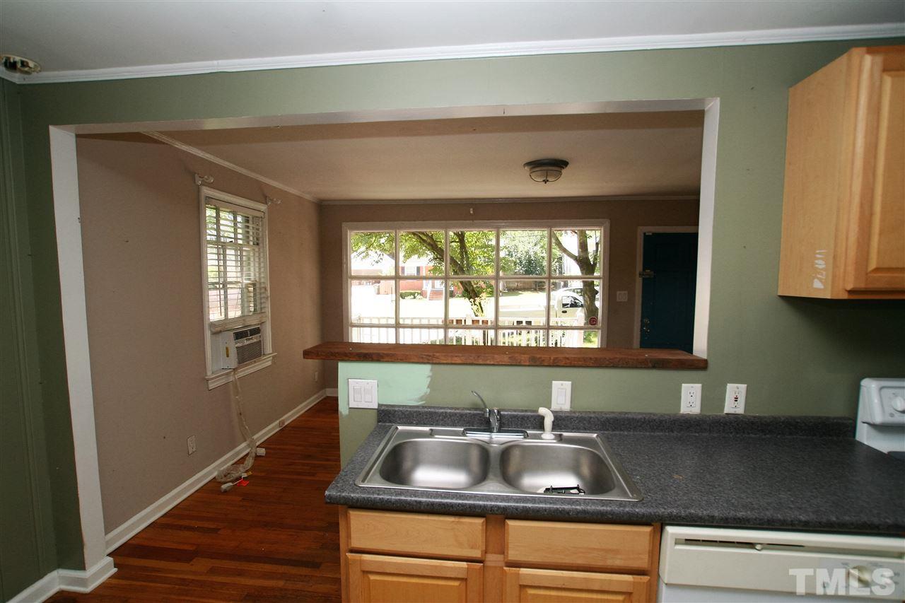 705 Mial Street Raleigh, NC 27608 - Photo 10 of 14 a kitchen with a sink and a window
