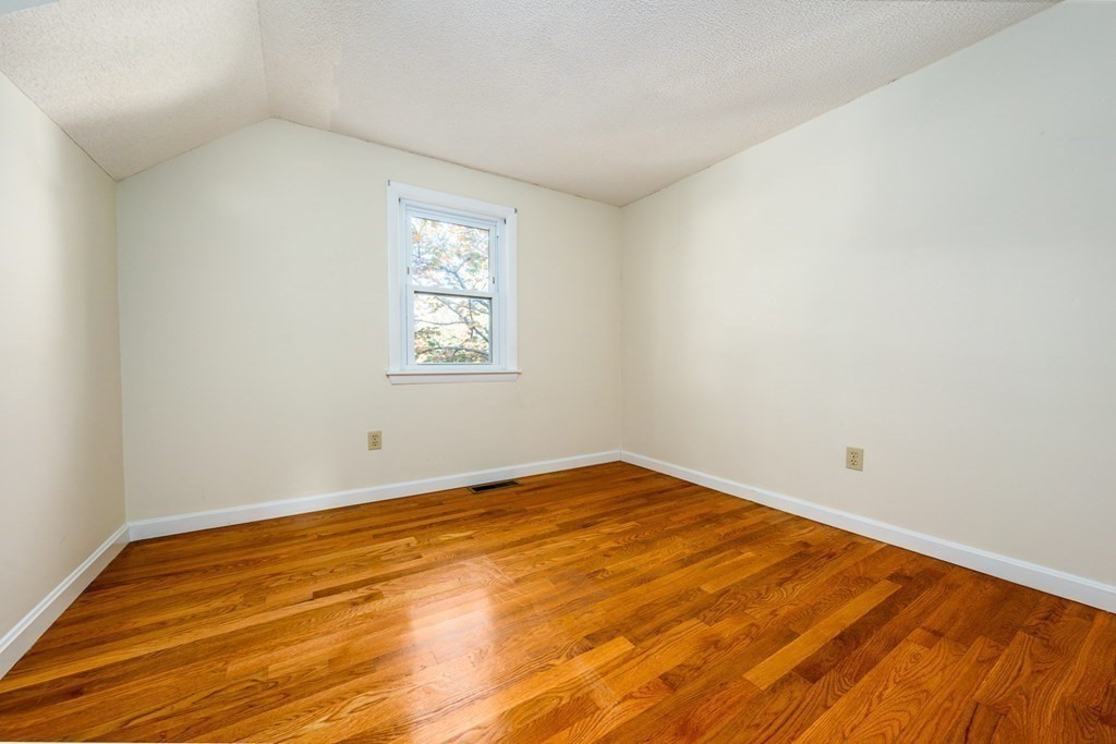 2 Uncle Percy's Road Mashpee, MA 02649 - Photo 16 of 32 a view of empty room with wooden floor and fan