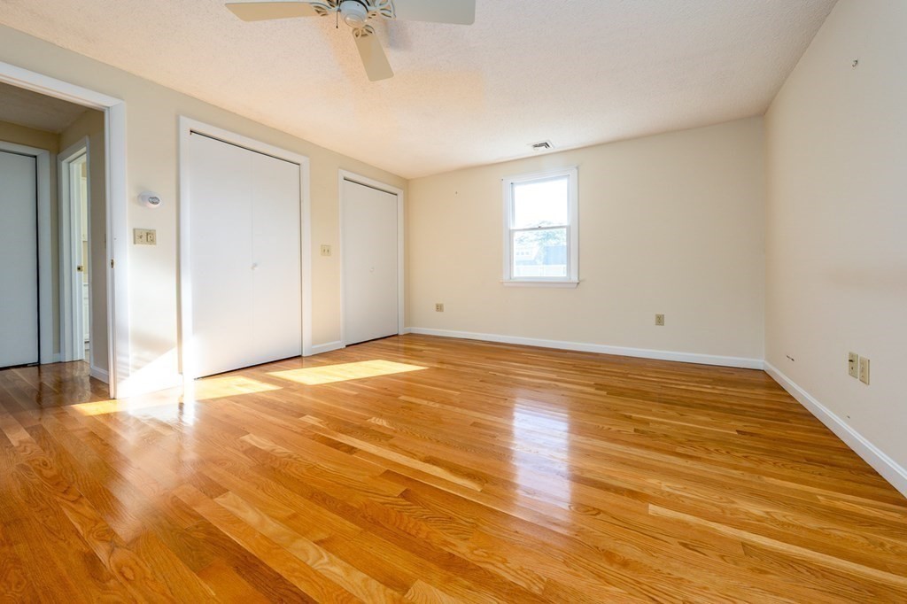 2 Uncle Percy's Road Mashpee, MA 02649 - Photo 20 of 32 a view of empty room with wooden floor and fan
