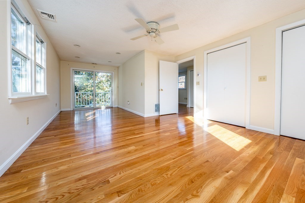 2 Uncle Percy's Road Mashpee, MA 02649 - Photo 21 of 32 a view of an empty room with wooden floor and a window