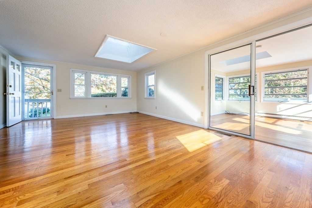2 Uncle Percy's Road Mashpee, MA 02649 - Photo 7 of 32 a view of an empty room with wooden floor and a window
