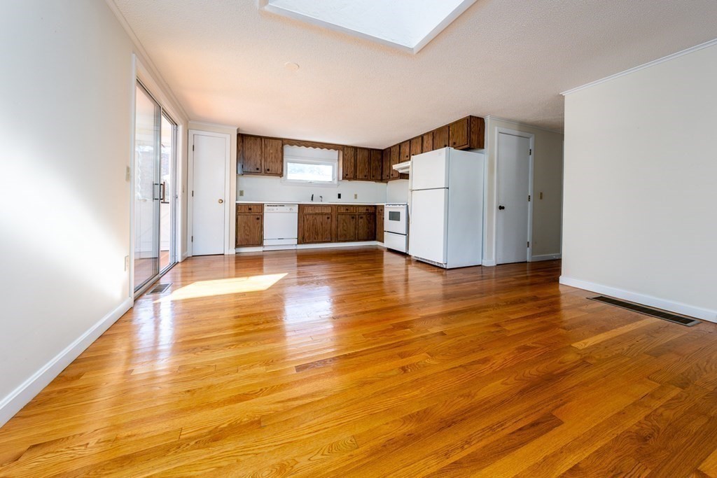 2 Uncle Percy's Road Mashpee, MA 02649 - Photo 9 of 32 a view of a livingroom with wooden floor