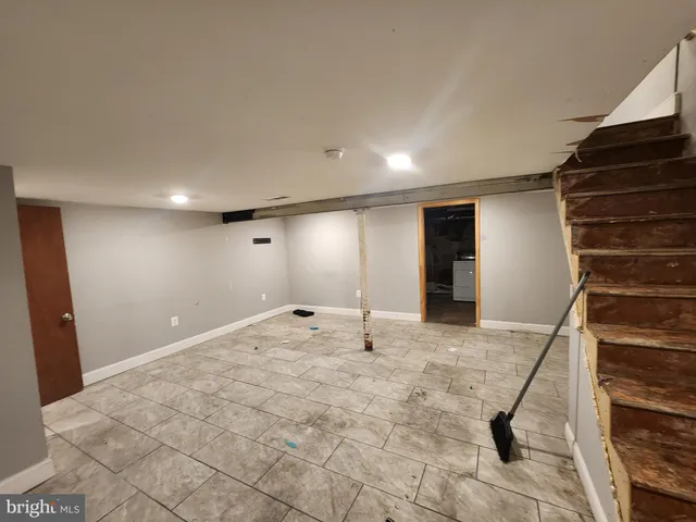 a view of a livingroom with a staircase