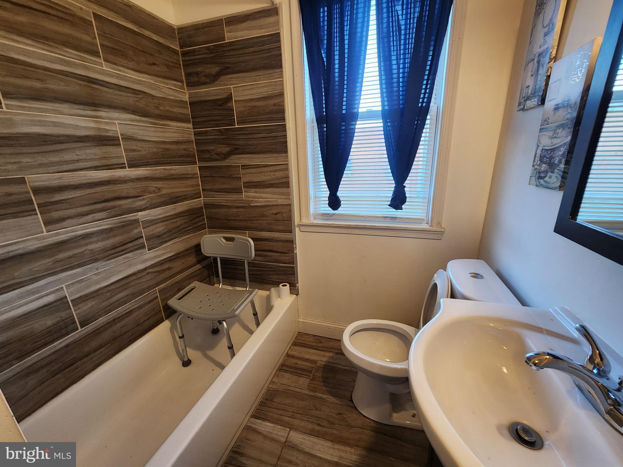 3213 Spaulding Avenue Baltimore, MD 21215 - Photo 25 of 26 a bathroom with a sink and a toilet