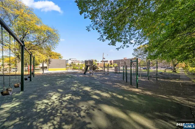 a view of a cars parked in front of a building