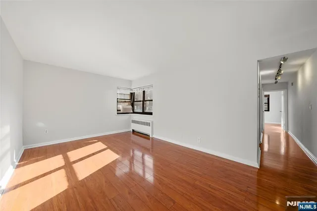 a view of a kitchen from the hallway