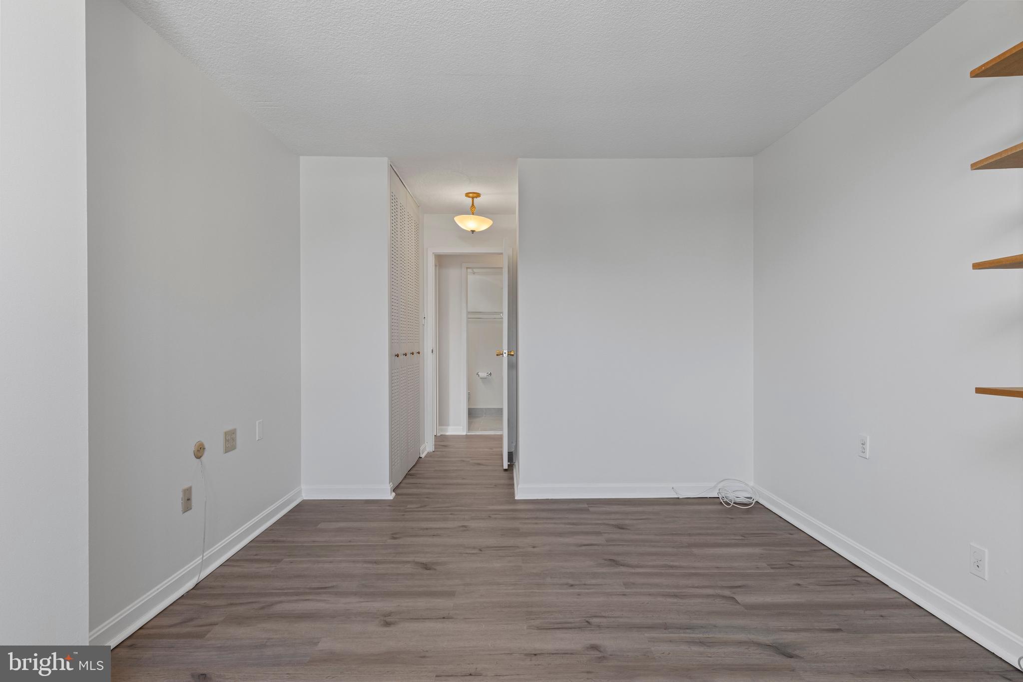 801 Yale Avenue, Unit 919 Swarthmore, PA 19081 - Photo 14 of 26 a view of an empty room and wooden floor