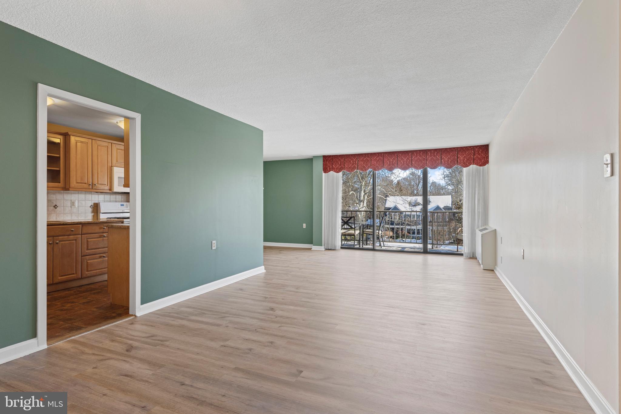 801 Yale Avenue, Unit 919 Swarthmore, PA 19081 - Photo 4 of 26 wooden floor window and outdoor view
