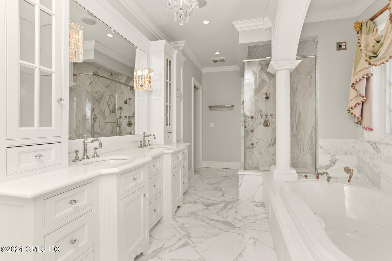 386 Westover Road Stamford, CT 06902 - Photo 20 of 32 a bathroom with a double vanity sink mirror and shower