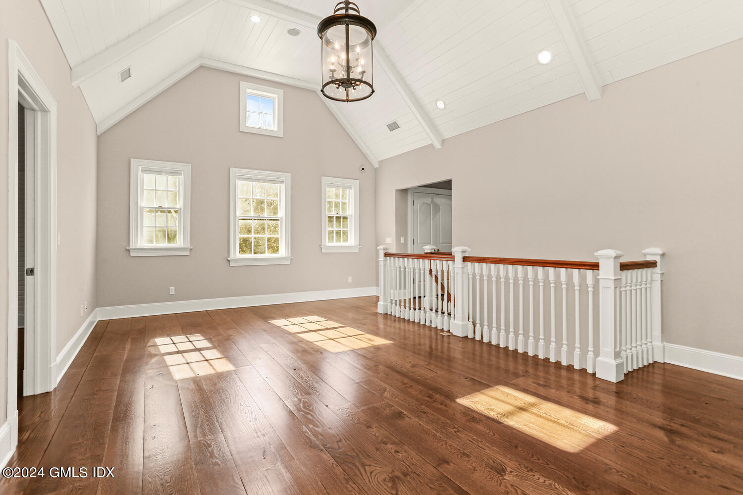 386 Westover Road Stamford, CT 06902 - Photo 21 of 32 a view of an empty room and window