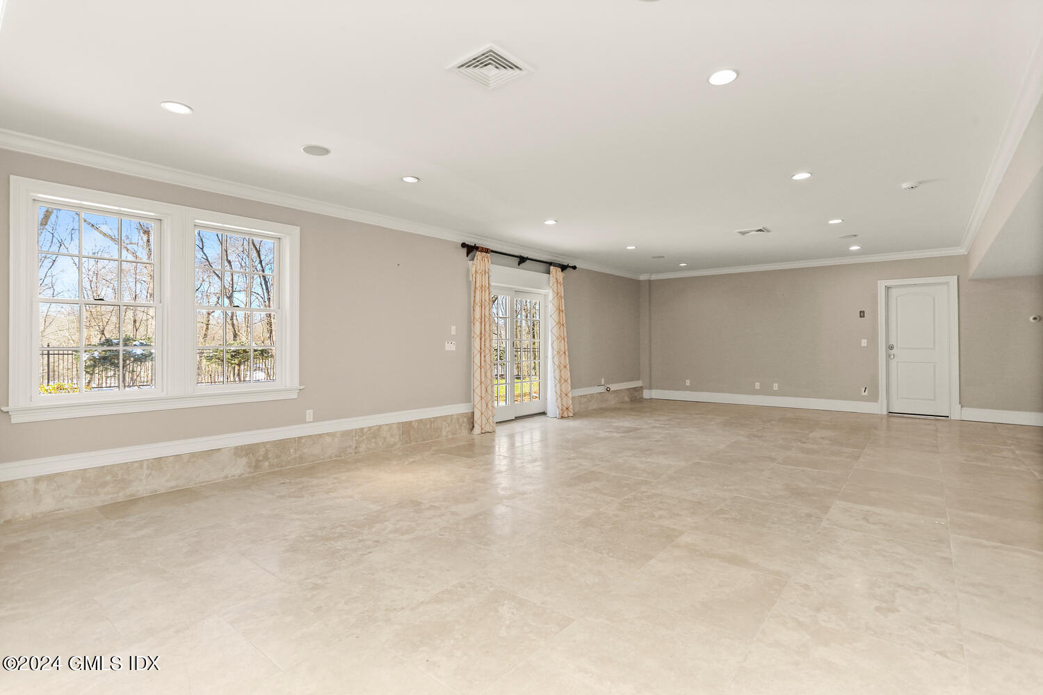 386 Westover Road Stamford, CT 06902 - Photo 26 of 32 a view of an empty room with a window