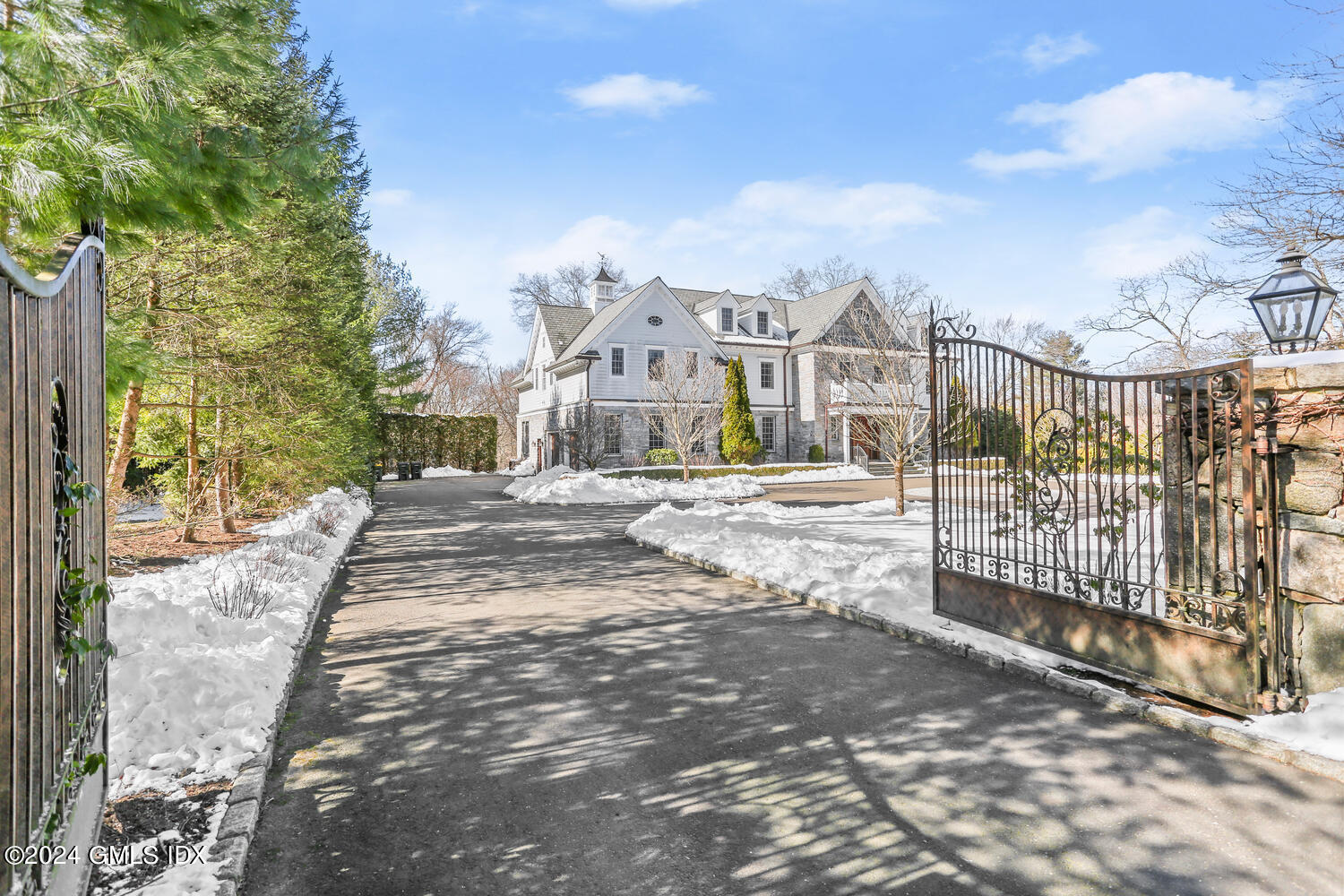 386 Westover Road Stamford, CT 06902 - Photo 32 of 32 a view of a house with a small yard and large trees
