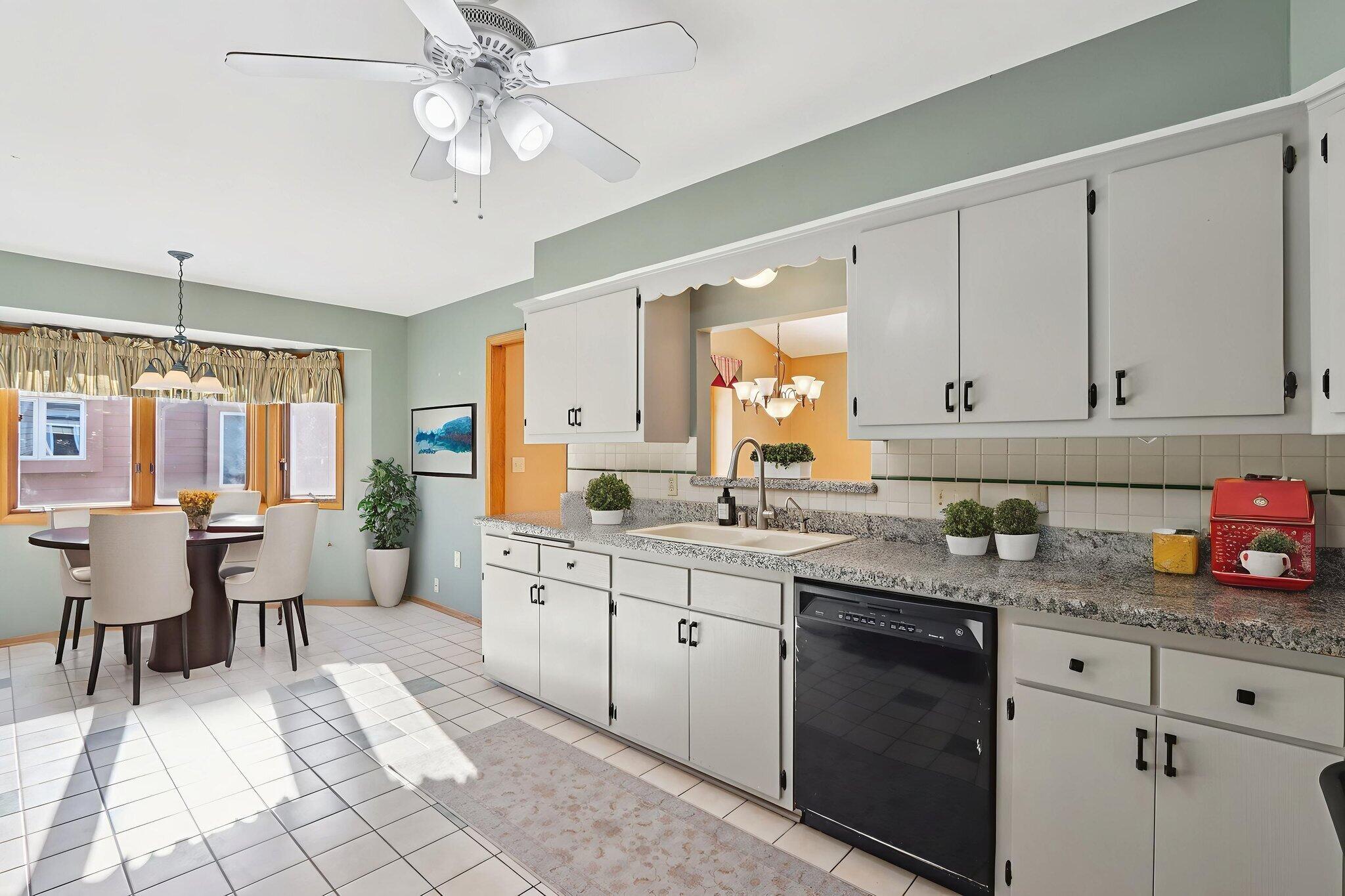 W178-n9743 Riversbend Circle East Germantown, WI 53022 - Photo 13 of 48 Virtually Staged Kitchen/Dining Area
